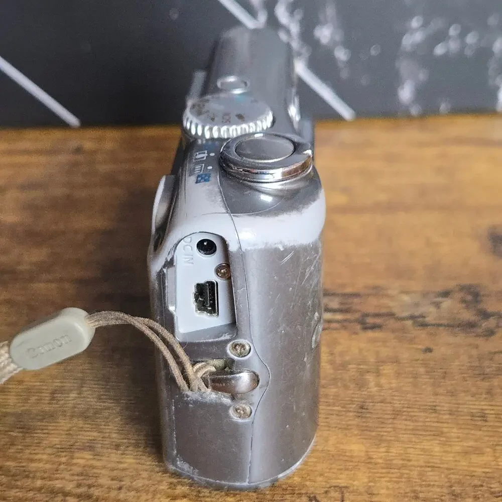 Canon PowerShot A1100 IS 12.1MP CCD Digital Camera Silver Tested Working